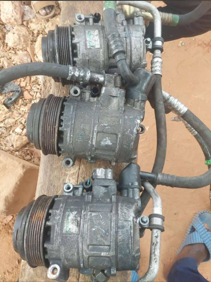 A picture of Car AC compressor condenser and evaporator