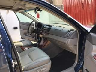 A picture of Pure First body Toyota Camry 2006 XLE V6 with a