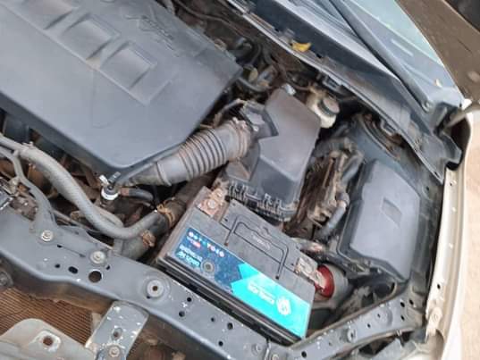 A picture of 2012 Toyota Corrolla with unscrew engine and gear plus chilling