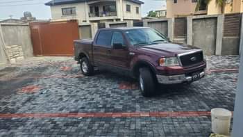 A picture of 2006 Ford F150 Lariat First User Untampered engine and gear