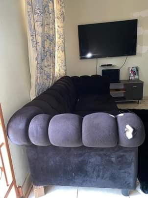 A picture of Used 3 seater chesterfield sofa