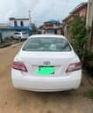 A picture of She Barely drive this car neatly used by a woman