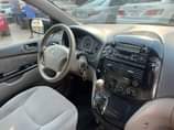 A picture of Neatly Baked Untampered Toyota Sienna 05