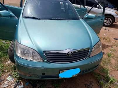 A picture of Toyota Camry first body pan motor engine and gear ac