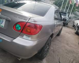 A picture of NEATLY USED TOYOTA COROLLA 2004.. 4.5 M..ENGINE GEAR AND AC