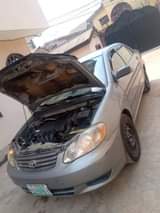 A picture of 04 Toyota Corolla Pure first body Gear AC chilling Everything