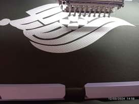 A picture of 2 Heads monograming machine