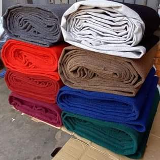 A picture of Artficial turf grass and wall wall woolen carpets