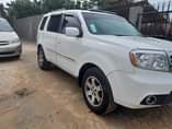 A picture of 2009 Honda pilot upgraded to 2013 10 months use u