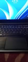 A picture of Dell i7 touchscreen portable and convertible at only 750 000
