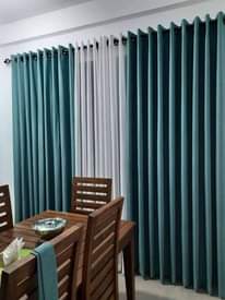 A picture of Curtains nets blinds and rods