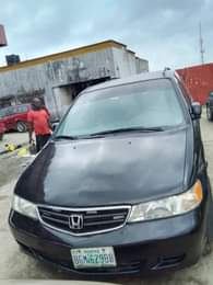 A picture of Neatly used honda odyssey All paper intact Engine AC chilling