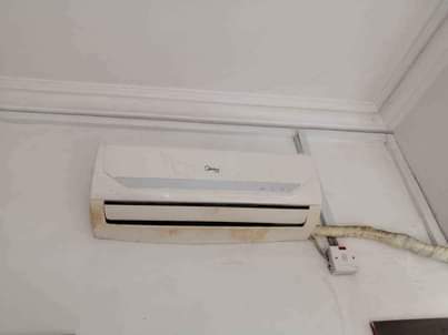 A picture of 1HP Midea Air Conditioner AC