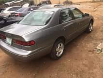 A picture of Neatly used toyota camry tiny light AC freezing engine and