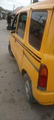 A picture of Daihatsu Hijet 2000 yellow