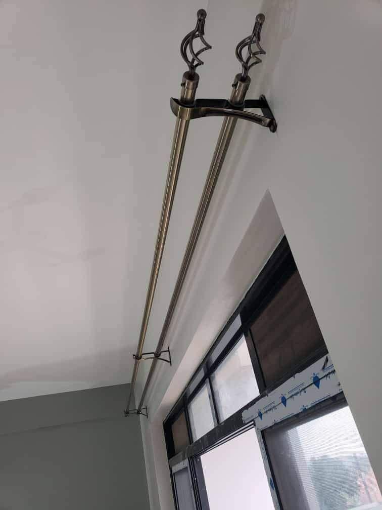 A picture of CURTAIN RODS AND ROLLS