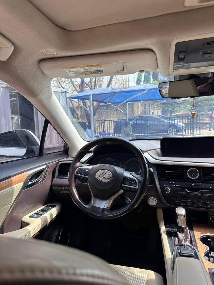 A picture of TOKS ESCAPE 2019 RX350L IN MINT CONDITION WITH ORIGINAL CUSTOM