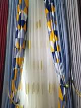 A picture of Curtains and rodes