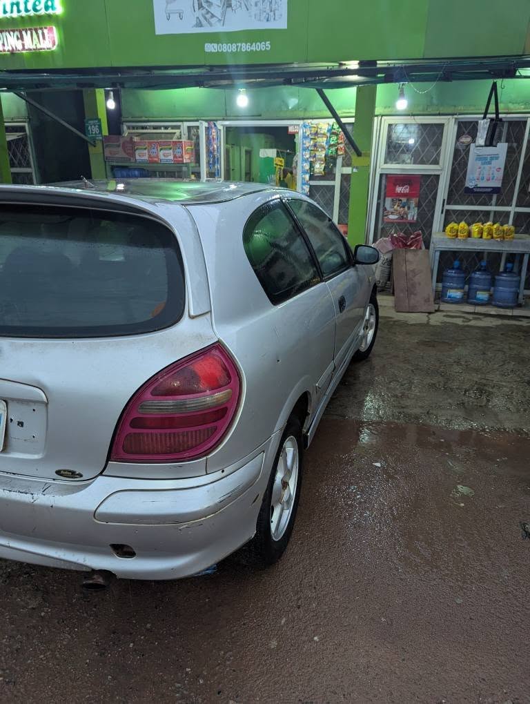 A picture of Nissan Almara 2003 model