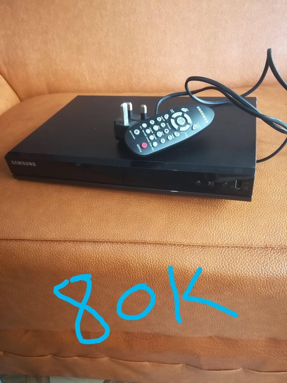 A picture of Computer printer and sumsung DVD for sale