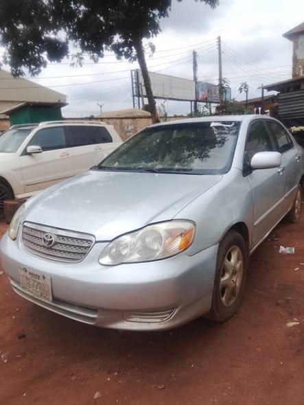 A picture of 2003 Corolla with bad engine