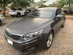 A picture of Distress very clean Kia Optima 2014 model with everything intact