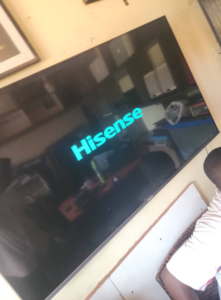 A picture of 50inch hisense smart TV for 850k with guarantee box and