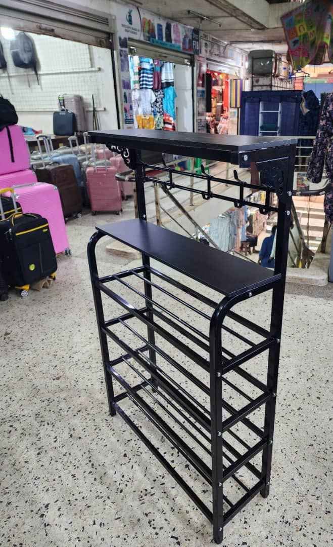 A picture of Heavy metal shoerack n bag holder