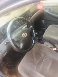 A picture of Toyota Corolla 06 model frst body with very low fuel