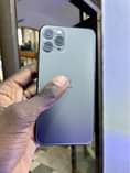 A picture of iPhone 11 Pro faceid working battery message 1250000 WhatsApp or