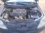 A picture of Nissan premera 2005 manual going for 750k Lagos Engine is
