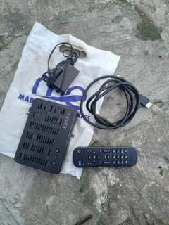 A picture of Dstv dikoda remote hdmi na adapter