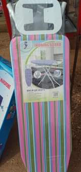 A picture of Ironing board original at shs 120 000