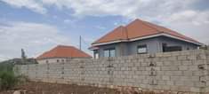 A picture of A house on quick sale in Kira 3 bedrooms ready