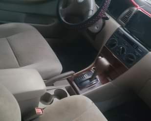 A picture of NEATLY USED TOYOTA COROLLA 2004.. 4.5 M..ENGINE GEAR AND AC