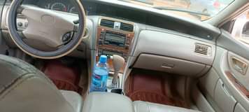 A picture of Super clean Toyota Avalon dashboard everything is working perfectly just