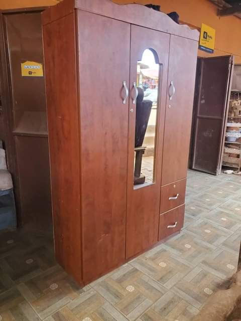 A picture of Three door closet