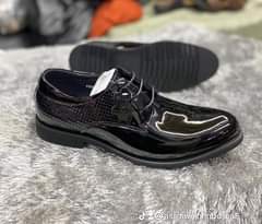 A picture of Great men s shoe s whatsapp 256704920917