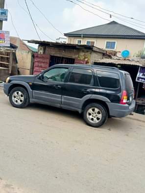 A picture of For sale asking price 2 3m Mazda tribute in Ajah