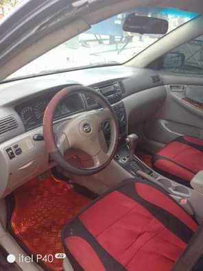 A picture of 2003 4 model corolla flashed on first body Ac chilling