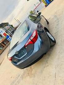 A picture of 2014 Toks Toyota Corolla. First body AC mortuary standard