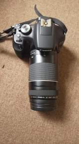 A picture of Leo ni mwendo wa offer tuu camera Canon d2000 lenz