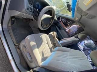 A picture of Distress Foreign Used 2003 model last batch Toyota Sienna with
