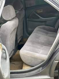 A picture of Super clean Toyota Camry with everything working perfectly going for