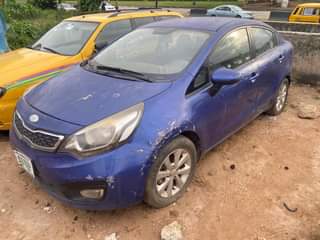 A picture of Kia Rio 2012 manual parked for a while engine is