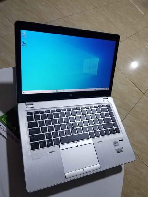 A picture of HP FOLIO CORE I5 MPYA FULL BOX BEI 330K MASHINE